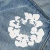 Luźne bawełniane spodnie Denim z motywem Cotton Wreath, jasne wykończenie