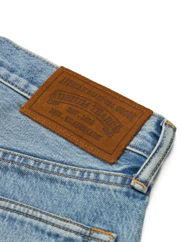 Luźne bawełniane spodnie Denim z motywem Cotton Wreath, jasne wykończenie