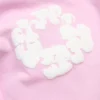 Spodenki dresowe z motywem „Cotton Wreath” w kolorze pudrowego różu