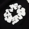 Szorty dresowe z motywem „Cotton Wreath” – czarne